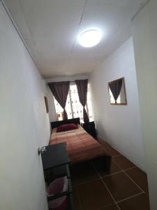 Postel nebo postele na pokoji v ubytování Casa Kitus