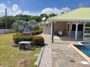 Casa con jardín y piscina en Villa Livia en Le Marin