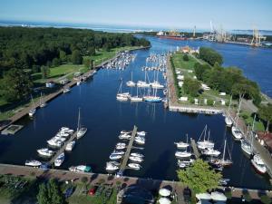 an aerial view of a marina with boats in the water at Nocleg na jachcie Ada2 w Świnoujsciu in Świnoujście