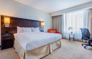 Letto o letti in una camera di Courtyard by Marriott Panama Metromall