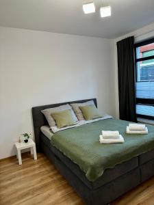 Ένα ή περισσότερα κρεβάτια σε δωμάτιο στο 2-bedroom Apartament Warszawa Praga