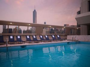a swimming pool on the roof of a building at Homewood Suites by Hilton Chicago Downtown - Magnificent Mile in Chicago