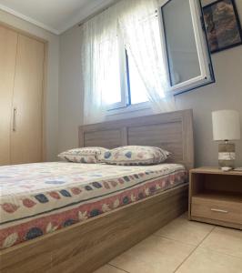 A bed or beds in a room at Small apartment, great view!