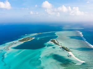 an aerial view of an island in the ocean at Conrad Maldives Rangali Island in Mandhoo