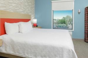 Postel nebo postele na pokoji v ubytování Home2 Suites By Hilton Fort Collins