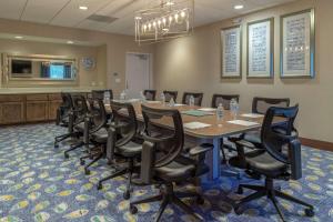 a conference room with a long table and chairs at Hampton Inn Bourbonnais Kankakee in Bourbonnais +15 photos