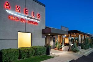 a xels sign on the side of a building at DoubleTree by Hilton Roseville Minneapolis in Roseville