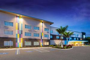 a building with a rainbow on the side of it at Tru By Hilton Bradenton I-75, FL in Bradenton