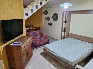 Säng eller sängar i ett rum på Casa em Paraty - RJ Cond. Fechado