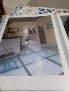um desenho de uma sala de estar com uma cozinha em Suítes de Aluguel em Jericoacoara