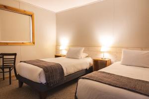 Giường trong phòng chung tại Hotel FioFio SPA