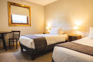 Giường trong phòng chung tại Hotel FioFio SPA