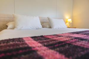 Giường trong phòng chung tại Hotel FioFio SPA