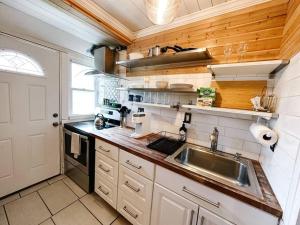 a kitchen with a sink and a counter top at Historic peaceful apartment in New Haven