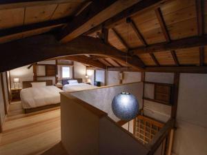 Lova arba lovos apgyvendinimo įstaigoje NIPPONIA HOTEL 伊賀上野 城下町