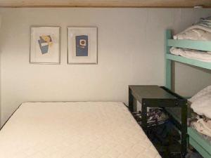 En eller flere senge i et værelse på Holiday home Grenaa L