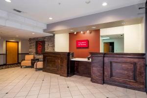 a lobby of a hospital with a reception desk at Red Roof Inn & Suites Biloxi in Biloxi
