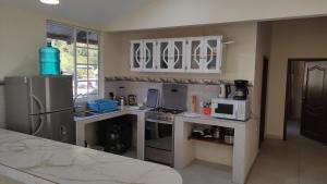 Kuchyň nebo kuchyňský kout v ubytování Apartamento "ROOFTOP view 360"