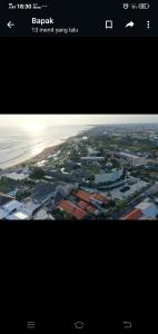 a view of a city from an airplane at Apartment Wayan in Canggu