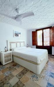 Postelja oz. postelje v sobi nastanitve Casa Palacios de Marchena