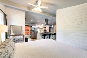 a bedroom with a bed with a ceiling fan at Atlanta Vacation Rental 9 Mi to Downtown! in Atlanta