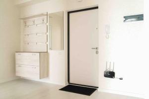 a bedroom with a dresser and a closet with a mirror at RentWill apartments Double in Chişinău +12 photos