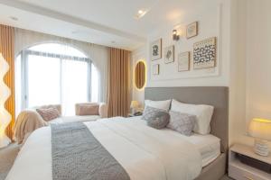 Voodi või voodid majutusasutuse Keypad Hotel - 87 Nguyễn Khang toas