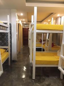 Palanda nebo palandy na pokoji v ubytování Siargao Zita's Garden Inn