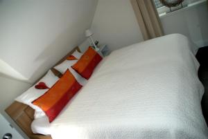 A bed or beds in a room at Ferienwohnung Allegra