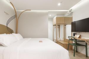 Double B Hostel客房内的一张或多张床位