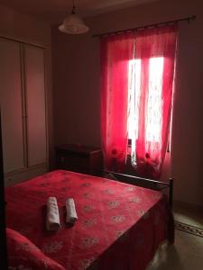 Llit o llits en una habitació de Fresco e Colorato Appartamentino in Narni Scalo