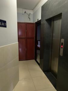 an empty hallway with a elevator in a room at Thanh Binh hotel in Ho Chi Minh City