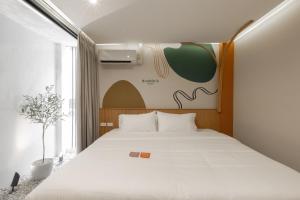 Double B Hostel客房内的一张或多张床位