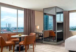 a hotel room with a view of a city at DoubleTree by Hilton Surabaya in Surabaya