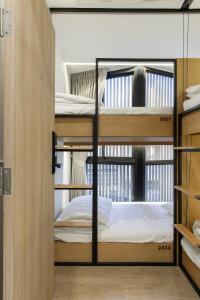 Double B Hostel客房内的一张或多张床位