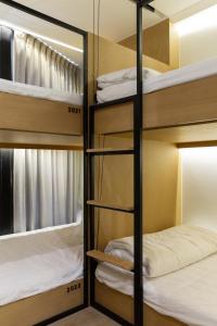 Double B Hostel客房内的一张或多张床位