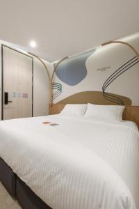 Double B Hostel客房内的一张或多张床位