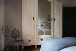 A bed or beds in a room at Casavilla Rentals by Torre a Cona