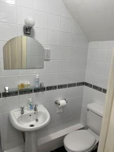 Ένα μπάνιο στο Kylemore Lakeview Retreat