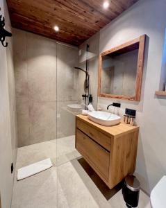 Ένα μπάνιο στο CHALET KITZBICHL by Alpin Charme Apartments
