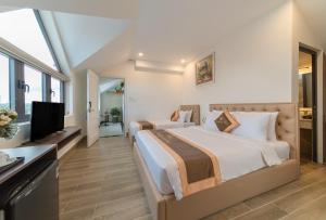 Postel nebo postele na pokoji v ubytování BẢO DUY HOTEL 5