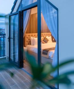 Postel nebo postele na pokoji v ubytování BẢO DUY HOTEL 5