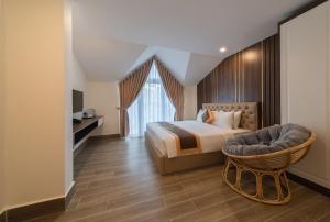 Postel nebo postele na pokoji v ubytování BẢO DUY HOTEL 5