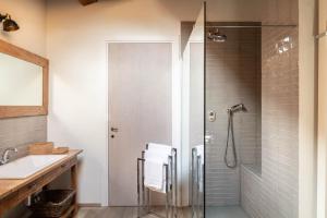 a bathroom with a shower and a sink at Castello di Buttrio in Buttrio