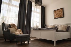 Posezení v ubytování LWB Ferienwohnung "Auszeit im Denkmal"