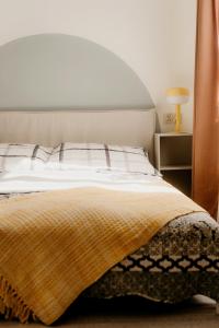 Ένα ή περισσότερα κρεβάτια σε δωμάτιο στο Flathouse Apartment 2 Centrum