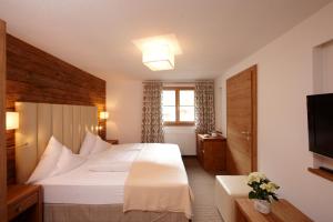 Posteľ alebo postele v izbe v ubytovaní Hotel Gridlon