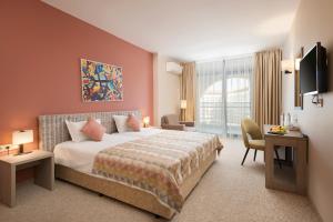 Ліжко або ліжка в номері Melia Sunny Beach All Inclusive