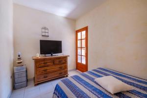 Ένα ή περισσότερα κρεβάτια σε δωμάτιο στο Appartement 4 personnes Le Tignet