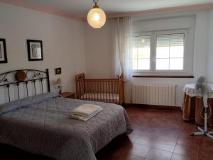 Postel nebo postele na pokoji v ubytování Villa Remedios